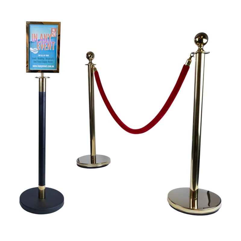 Gold velvet rope stanchion setup with an A4 sign holder attached to black and gold post with red velvet rope between bollards for VIP crowd control