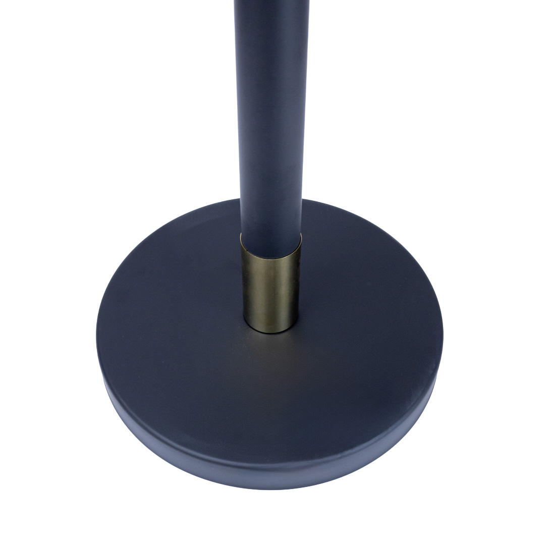 Close up of black stanchion base with gold accent ring showing weighted base for stable velvet rope bollard setup
