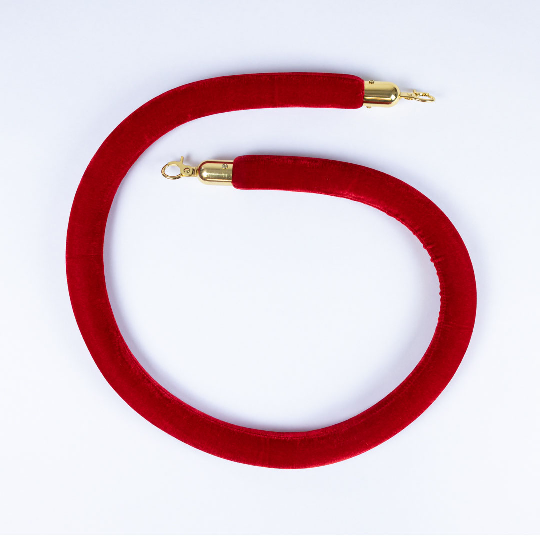Red velvet stanchion rope with gold hooks for VIP queue barrier system used in events weddings restaurants and retail entry