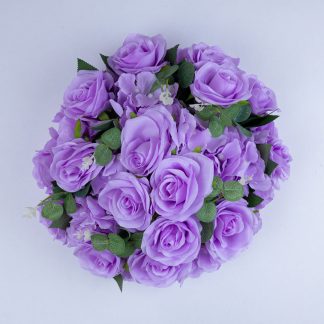Artificial lavender rose and hydrangea flower ball top view featuring soft lilac blooms and green leaves for weddings and receptions