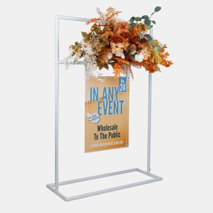 Double Metal Signage Stand in white with floral arrangement on top and a hanging event sign, ideal for weddings and event signage displays.