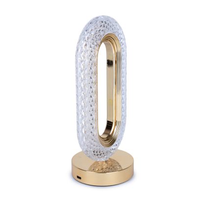 Rechargeable crystal touch lamp in gold finish shown from side angle displaying oval shape