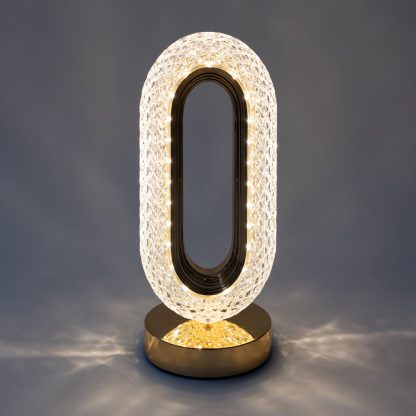 Crystal LED lamp illuminated in warm colour temperature creating ambient crystal light pattern