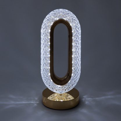 Crystal touch lamp glowing with cool white LED light and sparkling crystal effect