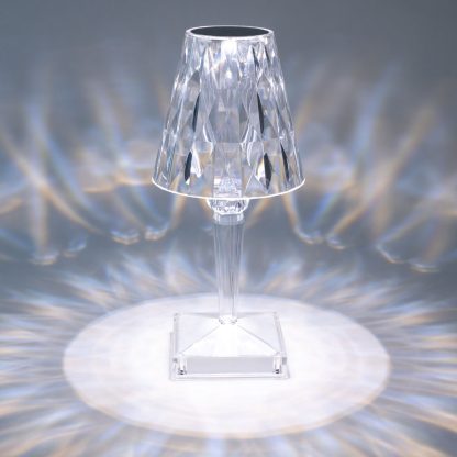 Diamond pattern crystal LED lamp illuminated with soft ambient light, showcasing luxury decorative table lamp for centrepieces.