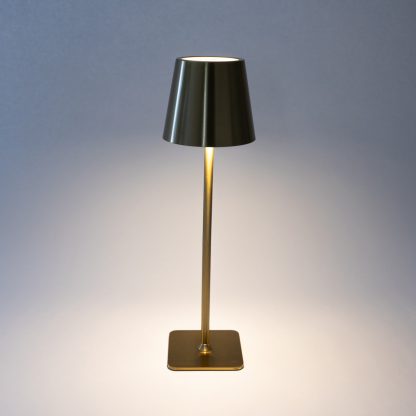Gold LED touch table lamp glowing with warm light – rechargeable metal touch dimmable lamp perfect for restaurants, hotels, and ambient décor.