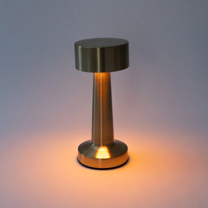 Gold mushroom LED touch lamp glowing with warm ambient light for cosy mood lighting