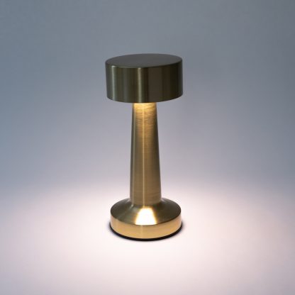 Gold rechargeable mushroom table lamp displaying neutral white light for balanced illumination