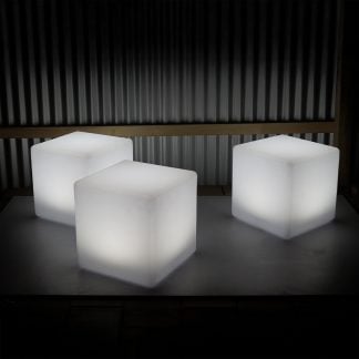 Set of three illuminated LED cube stools glowing white, perfect for party lighting, event furniture, and decorative ambient LED setups.