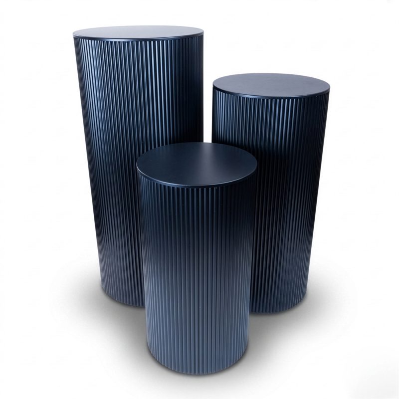 Set of three black metal ripple plinths in graduated heights