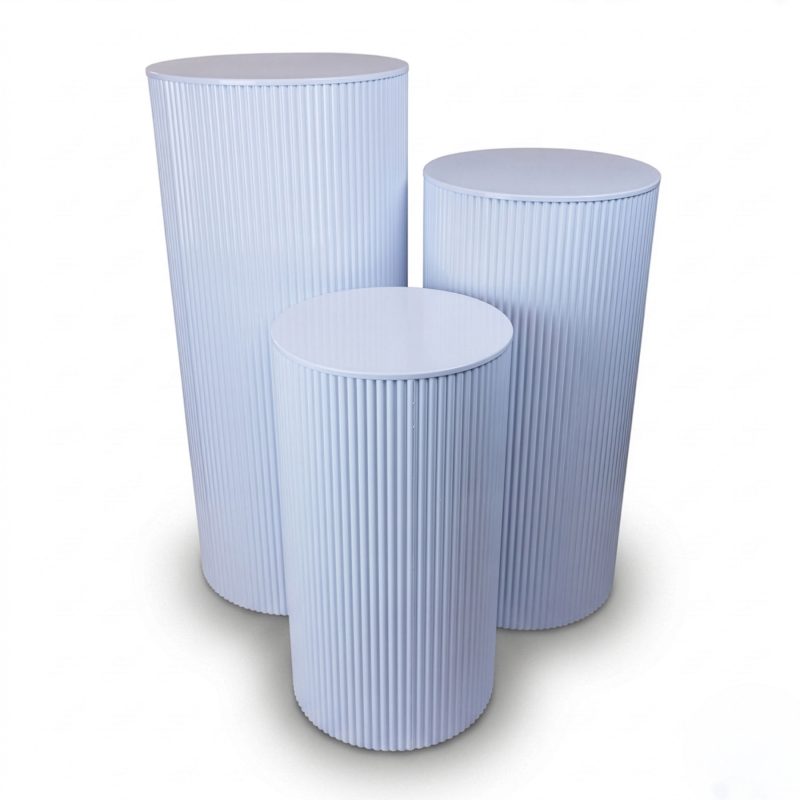 Set of three white metal ripple plinths in graduated heights