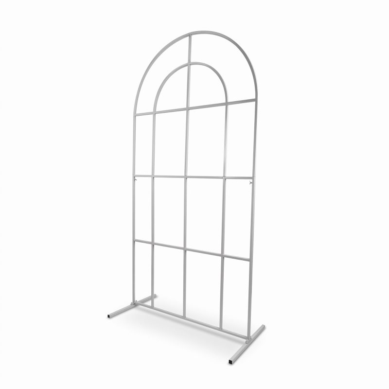 Windowpane arch backdrop stand in gloss white shown from an angle with freestanding feet